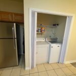 White appliances in a laundry room.